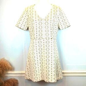 Chelsea & Violet ivory faux leather laser cut-out fit and flare V-neck dress